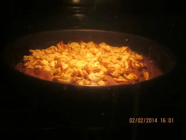 Rezept: Schoko-Kirsch-Kuchen mit Mandelknusper Schoko-Kirsch-Kuchen mit Mandelknusper - Rezept