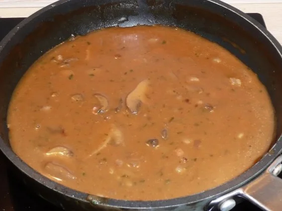 Schnitzelpäckchen gefüllt mit Champignons und Zwiebeln - Rezept - Bild Nr. 4