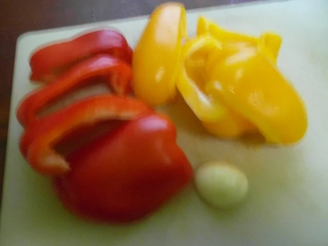 Rezept: Geflügel: Orangen-Ingwer-Hähnchen auf Knoblauch-Paprika-Reis Bild Nr. 2 Geflügel: Orangen-Ingwer-Hähnchen auf Knoblauch-Paprika-Reis - Rezept - Bild Nr. 2