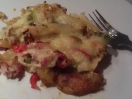 Westernkartoffeln mit Gemüse und Käse überbacken - Rezept