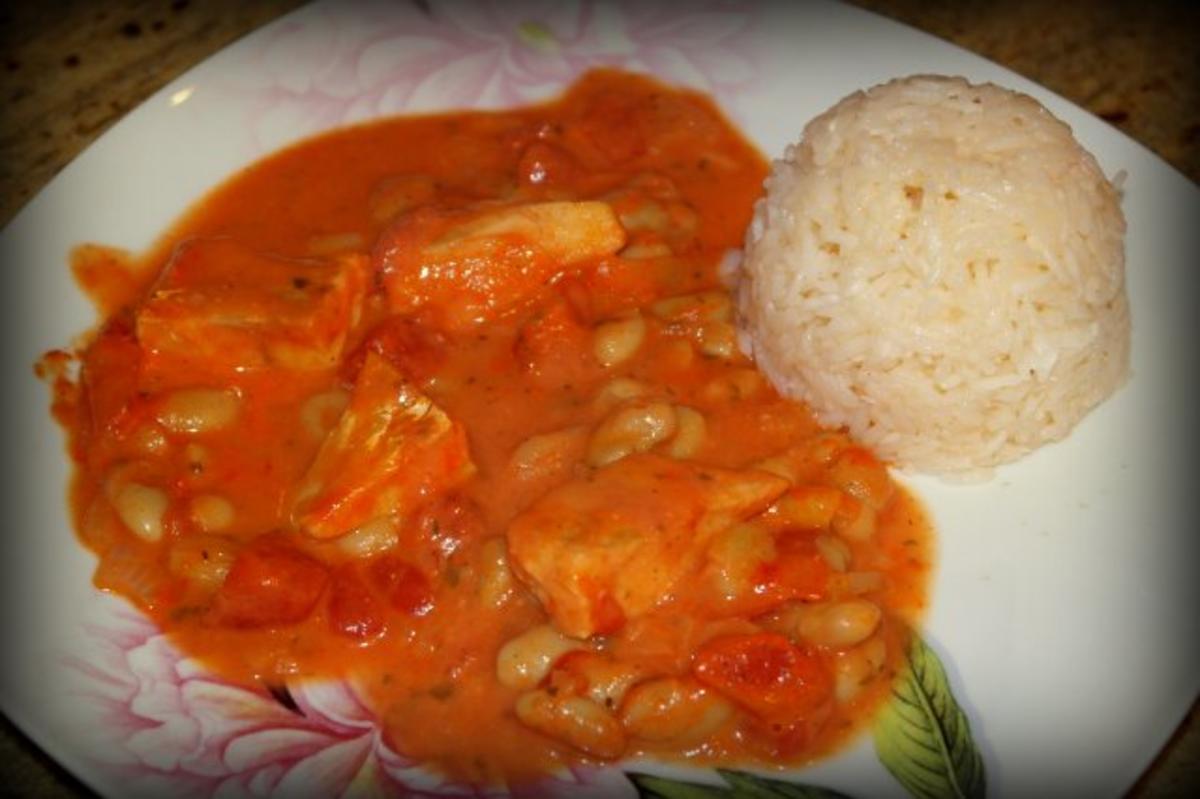 Bilder für Fisch in cremiger Tomatensauce - Rezept