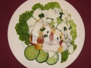 Paprikaschoten gefüllt mit Ei u. Schafskäse überbacken mit Joghurtguss - Paprika-Bürek - Rezept