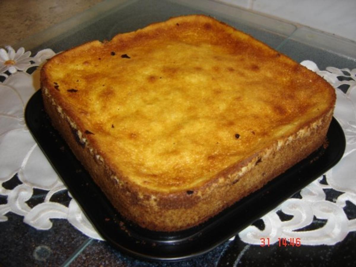 Bilder für Mirabellen-Rotweinkuchen mit Sauerrahmguß - Rezept