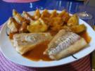Fisch: Pikanter Kabeljau mit Chakalaka-Kartoffelspalten - Rezept