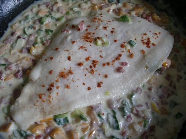 Scholle in Schinken - Paprika - Sahne - Rezept