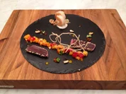 Nussiges Thunfisch-Surpreme auf Mangoragout und Garnele an Kokos-Chili-Fumet - Rezept