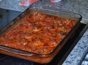 Gefüllte Riesenchampignons in Tomaten-Sahnesoße - Rezept