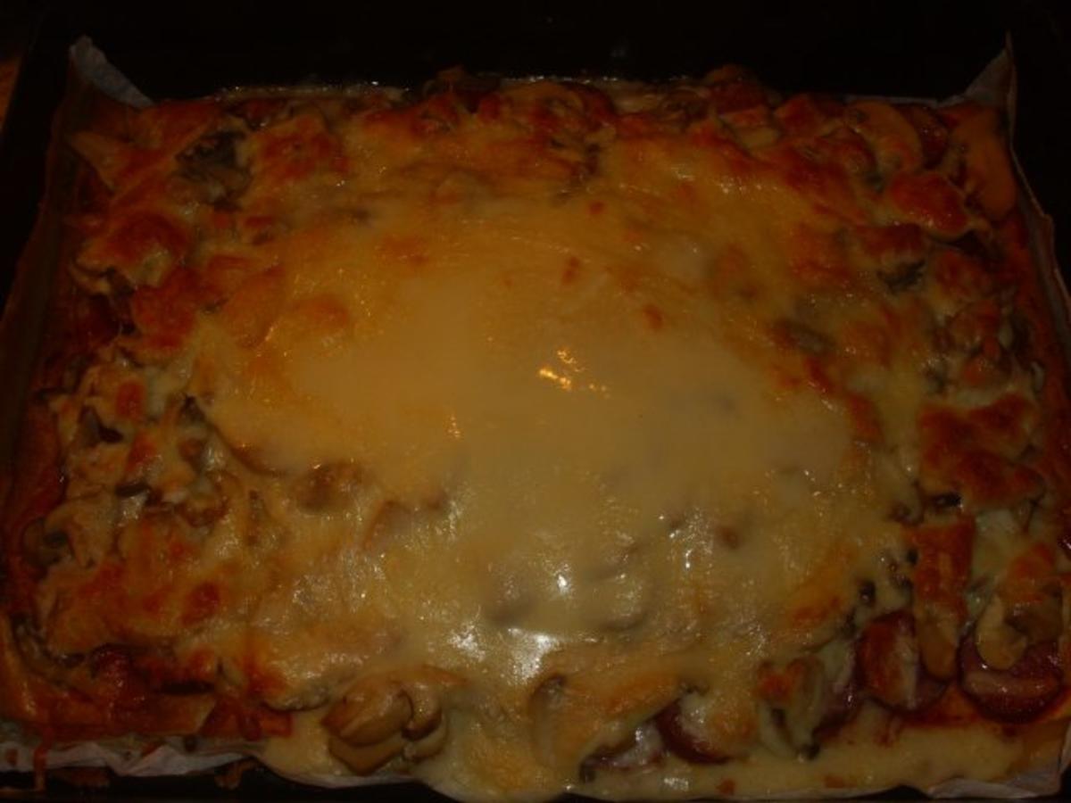 Cabanossi Pizza mit Käsefondue - Rezept