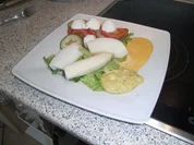 Tintenfischfilet gekocht auf Salat - Rezept