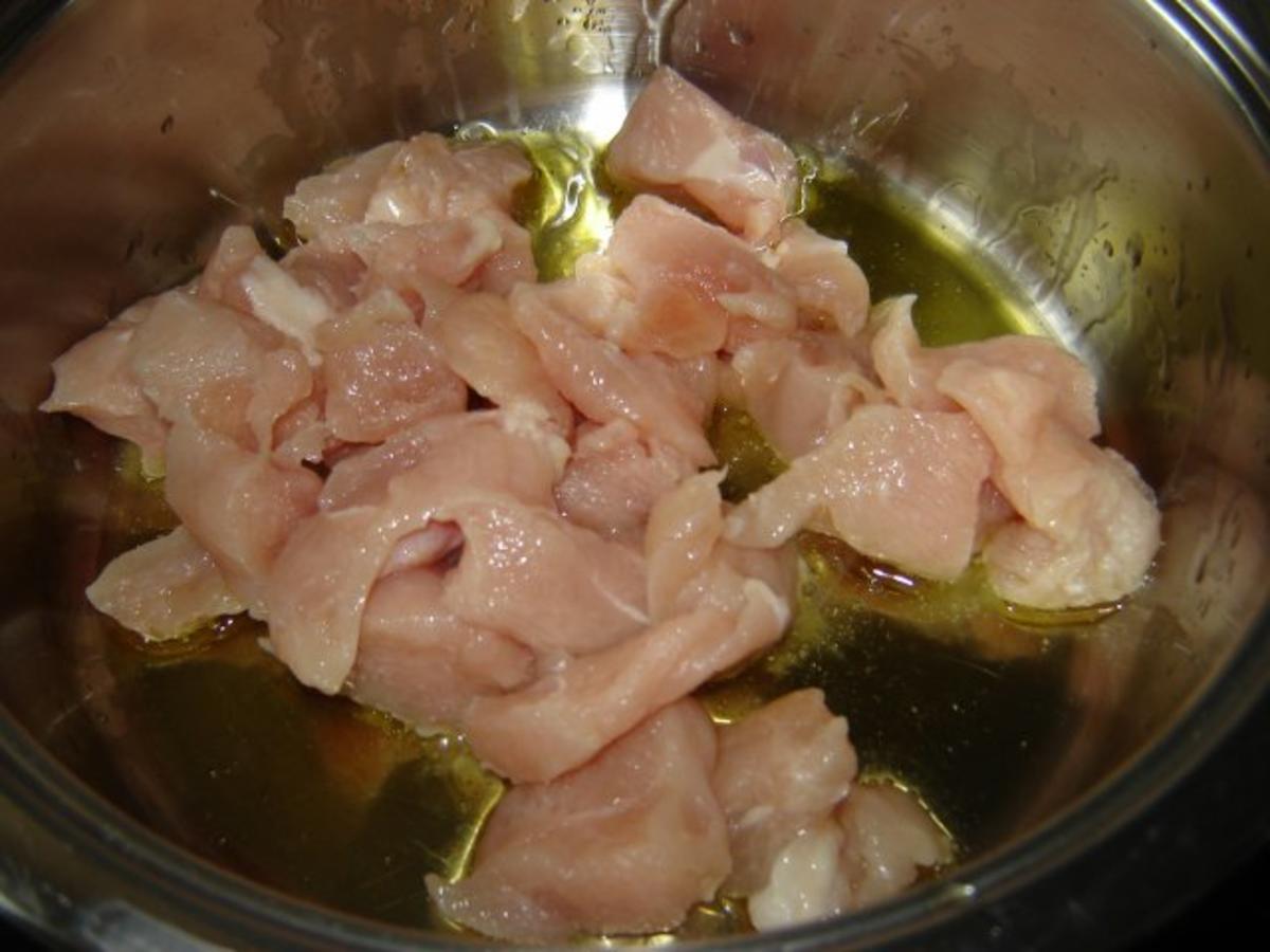 Hähnchenfleisch mit Möhren und Erbsen - Rezept - Bild Nr. 3