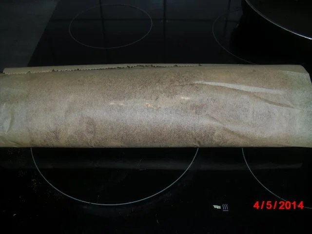 Rezept: Schoko-Biskuit-Rolle mit Sahne und Erdbeer-Füllung Bild Nr. 10 Schoko-Biskuit-Rolle mit Sahne und Erdbeer-Füllung - Rezept - Bild Nr. 10