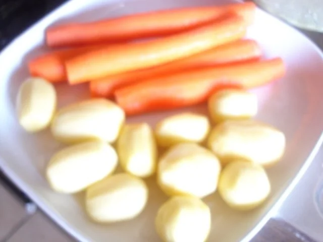 Rezept: Möhren-Zucchini-Blüten-Eintopf Bild Nr. 3 Möhren-Zucchini-Blüten-Eintopf - Rezept - Bild Nr. 3