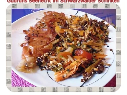 Rezept: Fisch: Seehecht im Schwarzwälder Schinken mit Ofengemüse Fisch: Seehecht im Schwarzwälder Schinken mit Ofengemüse - Rezept