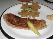 Falsches Kotelett mit Stern - Röstbrot und meinen schnellen Tomatensalat - Rezept