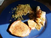 marinierte Schweinerückensteaks mit Blumenkohl und Curryreis - Rezept