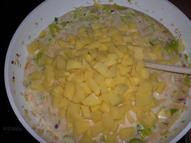 Rezept: Kartoffel-Lauch-Auflauf mit Schinken Bild Nr. 13 Kartoffel-Lauch-Auflauf mit Schinken - Rezept - Bild Nr. 13