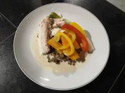 Doraden Filet in Weißwein-Knoblauchsoße auf Gemüsebett - Rezept