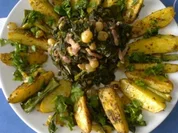 Spinat mit Rosinen und Speck - Rezept