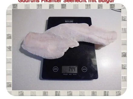 Rezept: Fisch: Pikanter Seehecht mit Bulgur und Tomatensoße Bild Nr. 2 Fisch: Pikanter Seehecht mit Bulgur und Tomatensoße - Rezept - Bild Nr. 2