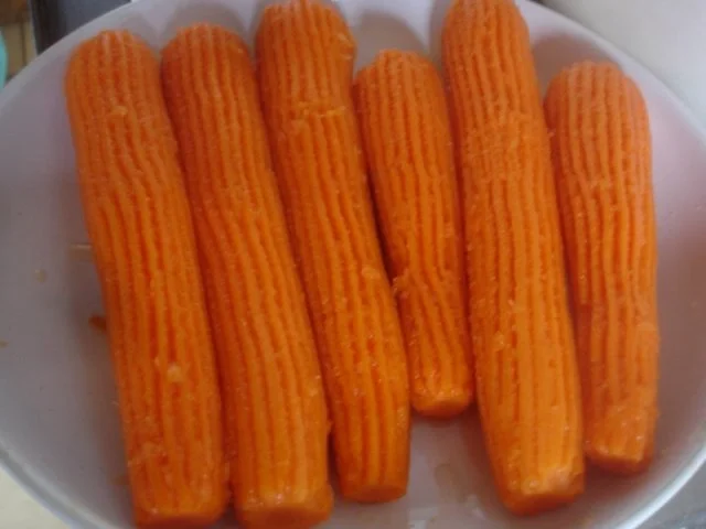 Rezept: Hackfleischklopse mit Sauce, Möhren-Zucchini-Kartoffel-Stampf und Möhrenblütengemüse Bild Nr. 12 Hackfleischklopse mit Sauce, Möhren-Zucchini-Kartoffel-Stampf und Möhrenblütengemüse - Rezept - Bild Nr. 12