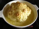 mit Käse überbackener Blumenkohl - Rezept