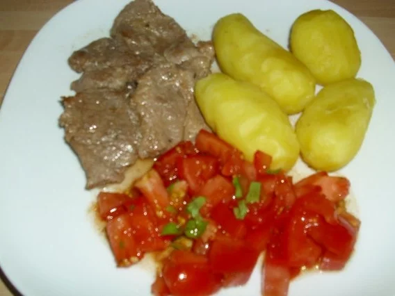 Schweinesteaks mit Pellkartoffeln - Rezept