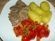 Rezept: Schweinesteaks mit Pellkartoffeln Schweinesteaks mit Pellkartoffeln - Rezept