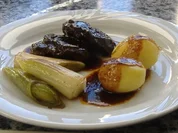 Kalbsbäckchen mit Portweinjus und Lauch - Rezept