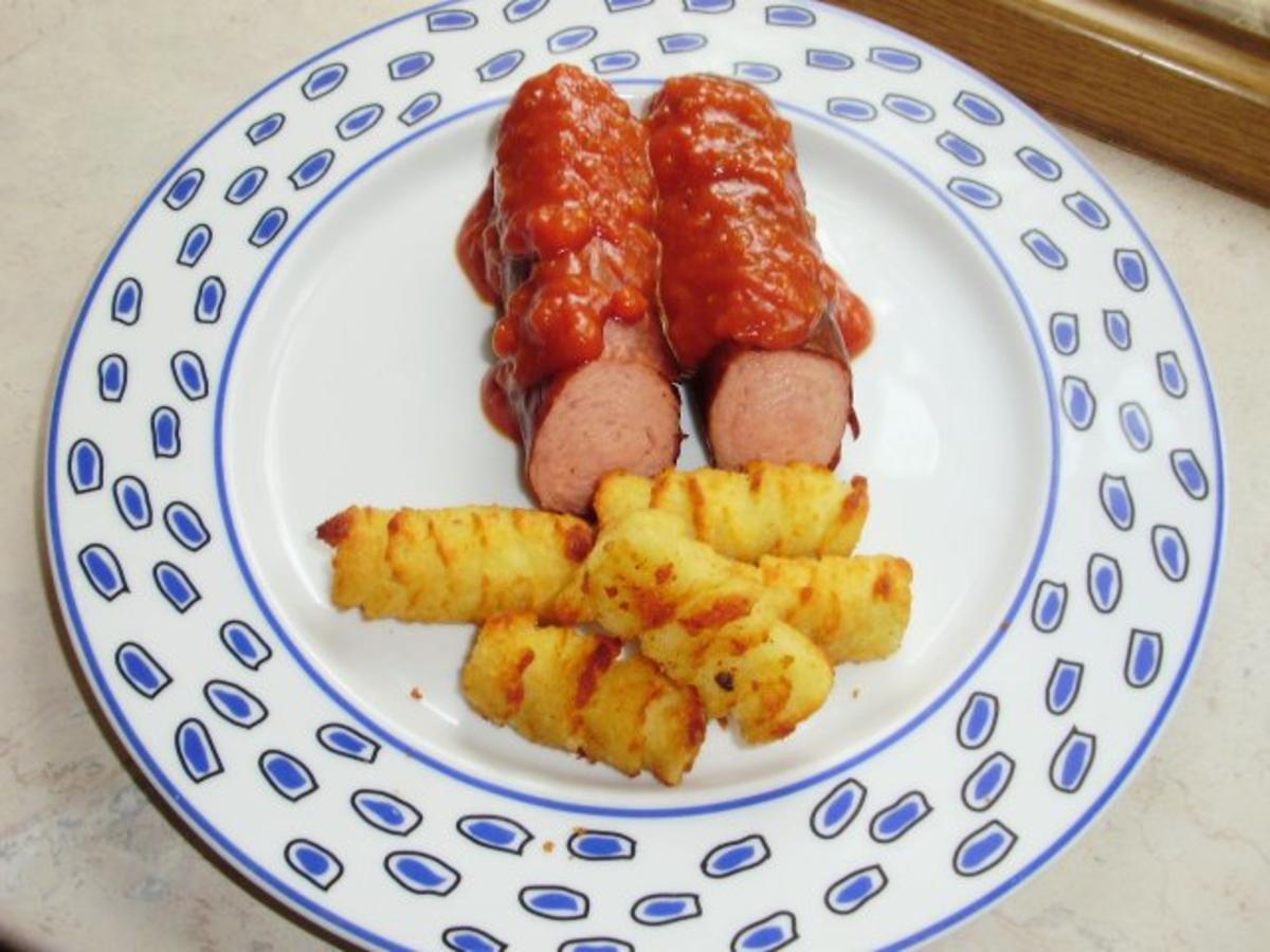 Bilder für Currywurst mit Currywürste und Passierte Tomaten - Rezept