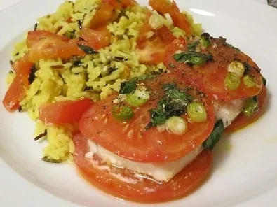 Schellfisch im Tomatenbett mit Reis - Rezept