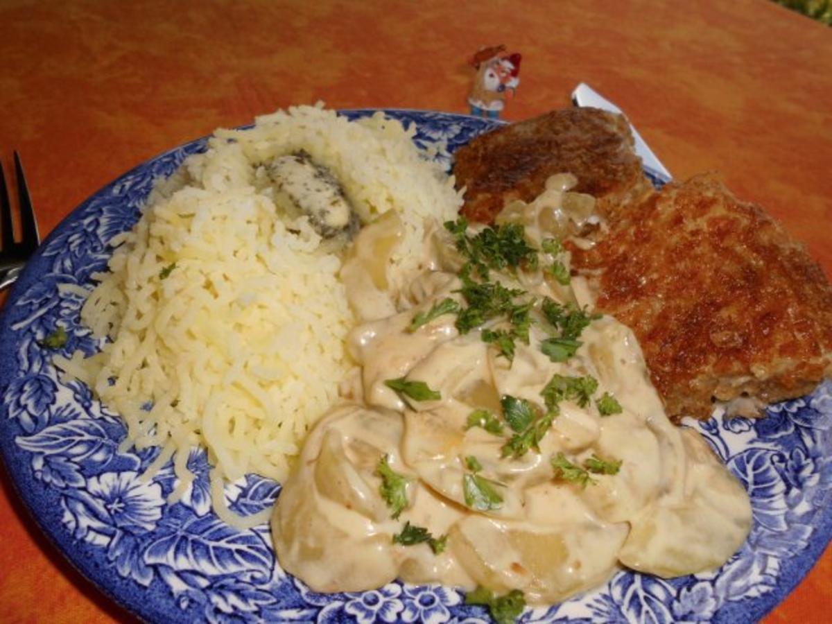 Bilder für Schmorgurken in Senfsahne mit Knusperfisch>> - Rezept