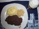Grützwurst mit Sauerkraut und Kartoffelstampf - Rezept