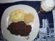 Grützwurst mit Sauerkraut und Kartoffelstampf - Rezept