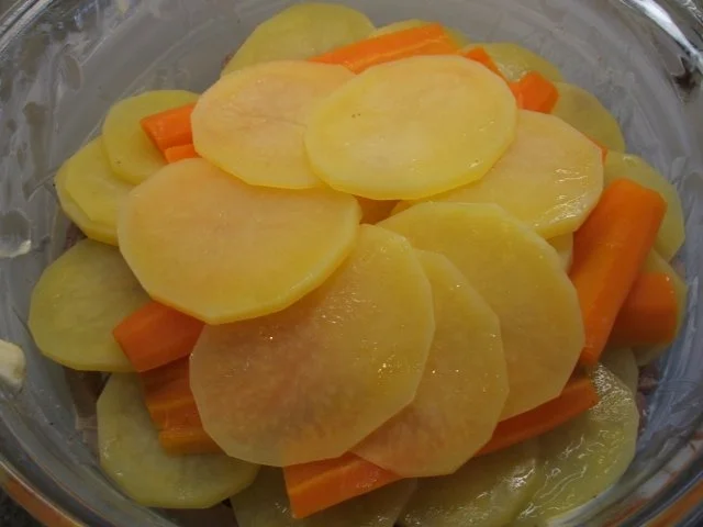 Rezept: Auflauf: "Begrabener Seelachs" Bild Nr. 7 Auflauf: "Begrabener Seelachs" - Rezept - Bild Nr. 7