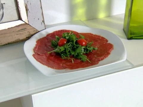 Rezept: Rinder - Carpaccio mit Rucolasalat als Obermann (Alexander Leipold) Rinder - Carpaccio mit Rucolasalat als Obermann (Alexander Leipold) - Rezept