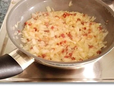 Rezept: Geschmortes Sauerkraut, Kartoffelrösti und Blutwurst darauf Bild Nr. 7 Geschmortes Sauerkraut, Kartoffelrösti und Blutwurst darauf - Rezept - Bild Nr. 7