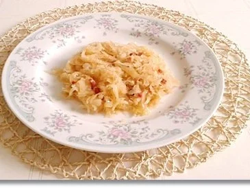 Rezept: Geschmortes Sauerkraut, Kartoffelrösti und Blutwurst darauf Bild Nr. 18 Geschmortes Sauerkraut, Kartoffelrösti und Blutwurst darauf - Rezept - Bild Nr. 18