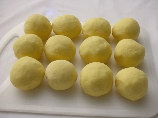 Zwetschgenknödel mit Apfel-Zwetschgen-Sauce - Rezept - Bild Nr. 11