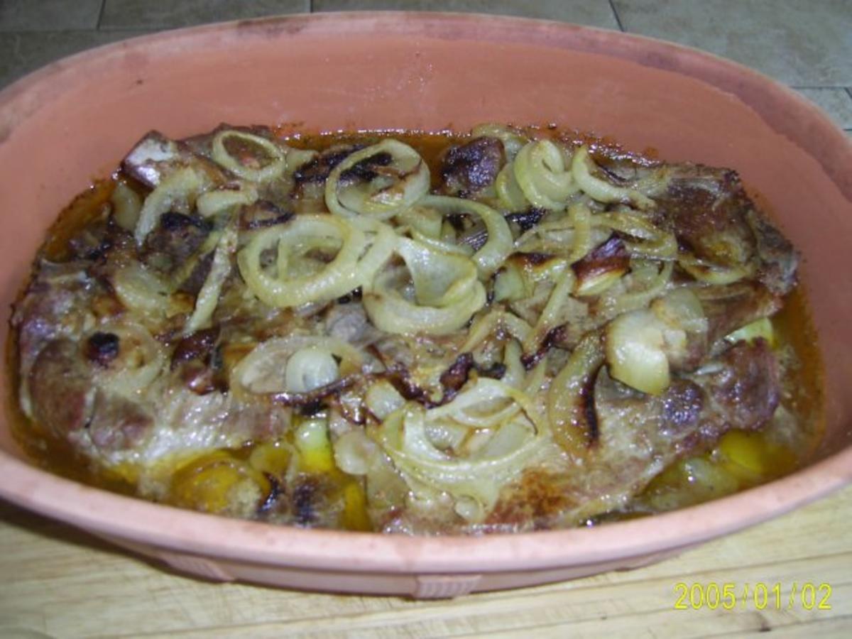 Schwein: Würzige Zwiebel-Nackenkoteletts - Rezept