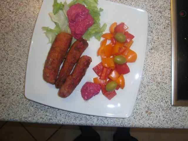 rote Streifen vom Riesenkalmar, eingelegt, paniert und fritiert - Rezept