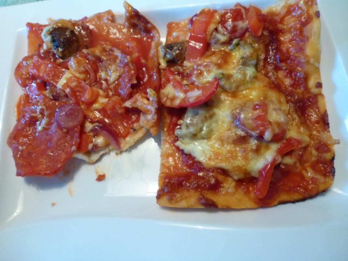 Pizza mit extra viel Belag - Rezept mit Bild - kochbar.de