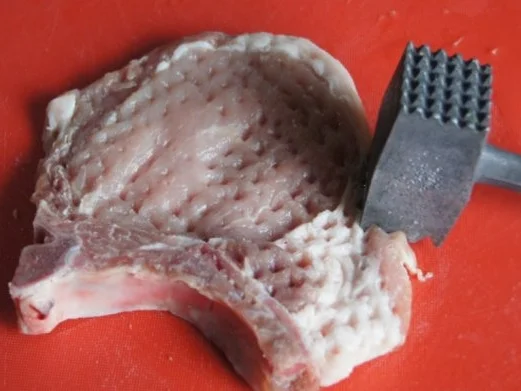 Rezept: Stielkotelett mit Erbsenpüree und Kartoffelstampf Bild Nr. 3 Stielkotelett mit Erbsenpüree und Kartoffelstampf - Rezept - Bild Nr. 3