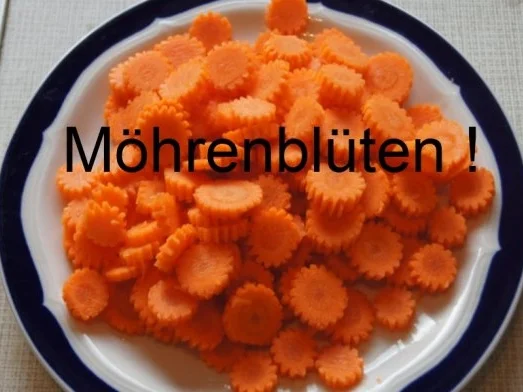 Fischfilet-Wok mit Kaiserschoten und Möhrenblüten - Rezept - Bild Nr. 5