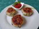 Schnelle Fischfrikadellen mit Paprika-Tomaten -Sauce - Rezept