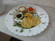 Dialog vom Kaviar auf Kartoffelplätzchen - Rezept