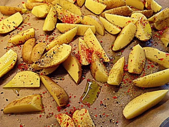 Rezept: Beilage: Gomasio-Kartoffelspalten aus dem Ofen Bild Nr. 2 Beilage: Gomasio-Kartoffelspalten aus dem Ofen - Rezept - Bild Nr. 2