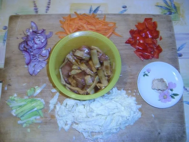 Huhn im Wok mit Bambus und Kraut - Rezept - Bild Nr. 2