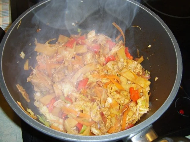 Huhn im Wok mit Bambus und Kraut - Rezept - Bild Nr. 8