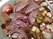 Essigfleisch mit Zwiebel und steirischem Kernöl - Rezept
