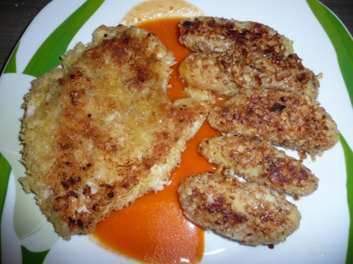 Putenschnitzel in Paprika - Rahm - Soße an Kroketten mit Rotkohl - Apfelsalat - Rezept